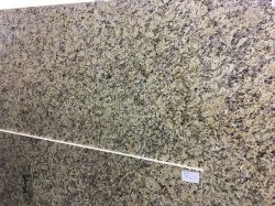 brown and white granite slab for countertops, backsplash, fireplaces, and more