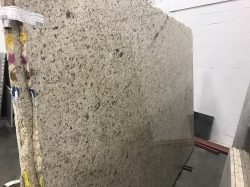 brown and black granite slab for countertops, backsplash, fireplaces, and more