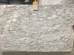white and black granite slab for countertops, backsplash, fireplaces, and more
