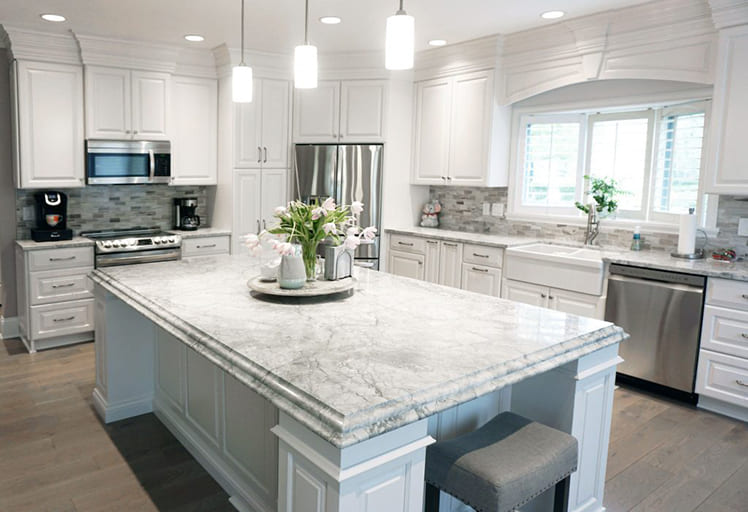 all white kitchen with quartz countertop